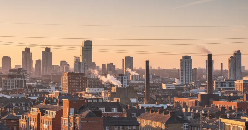 urban UK skyline at golden hour with no identifiable landmarks or readable signage
